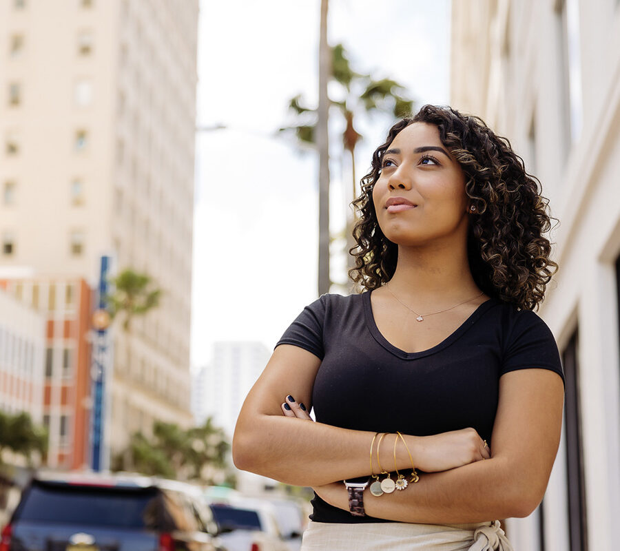 Student from Master of Accountancy 3+2 program stands outside in West Palm Beach.